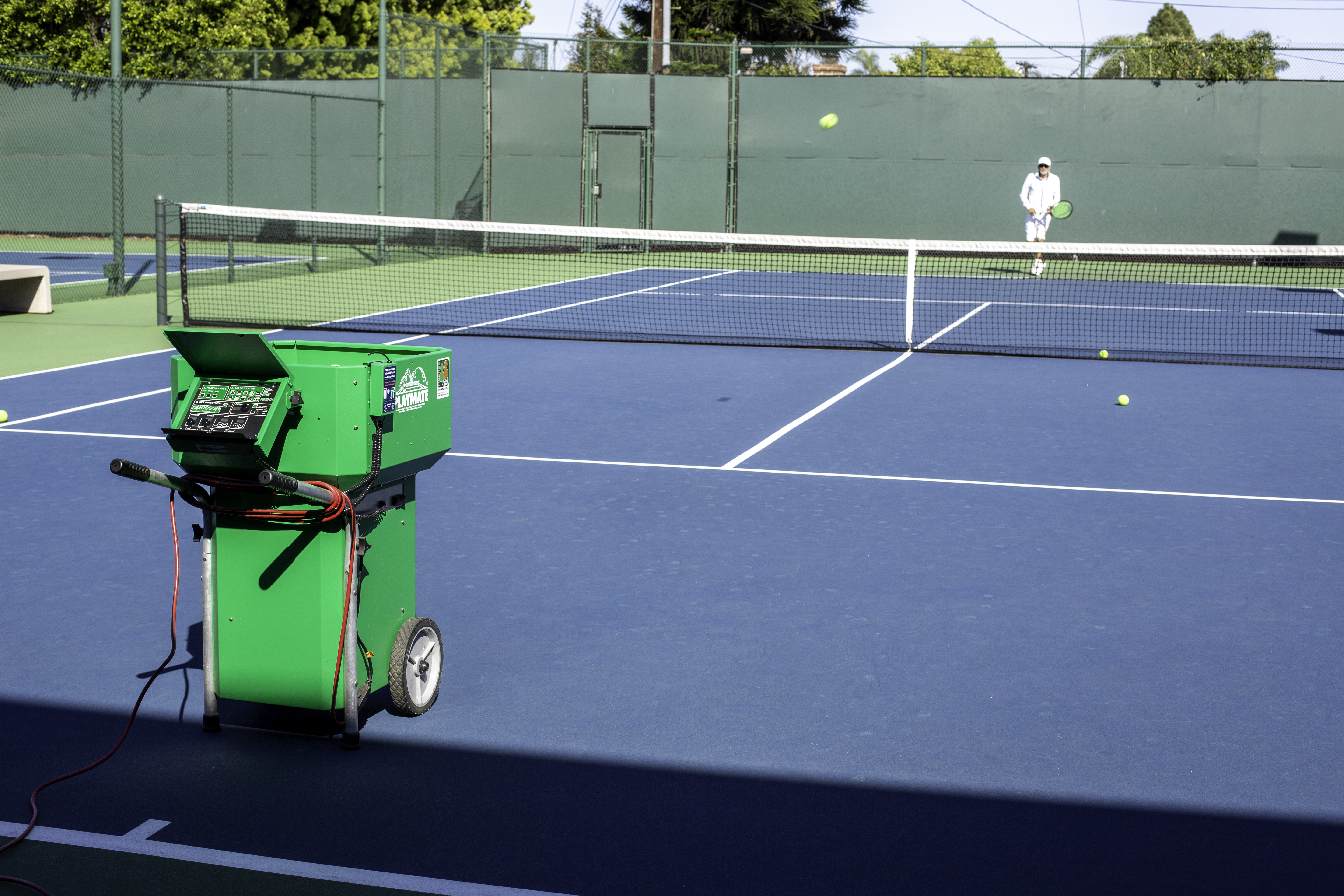 Tennis court and ball machine rentals at X-isle Sports